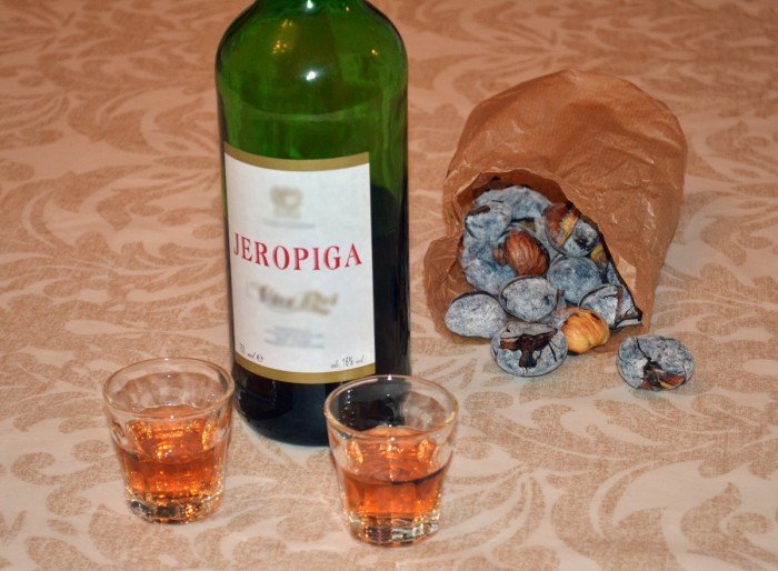 Chestnuts and wine on the table - autumn portuguese tradition